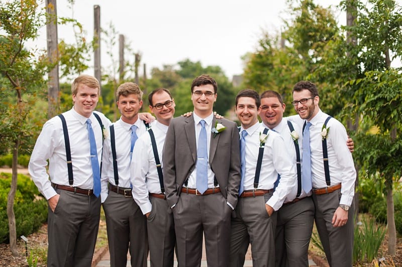 Groomsmen in suspenders with light blue ties- A.J. Dunlap Photography