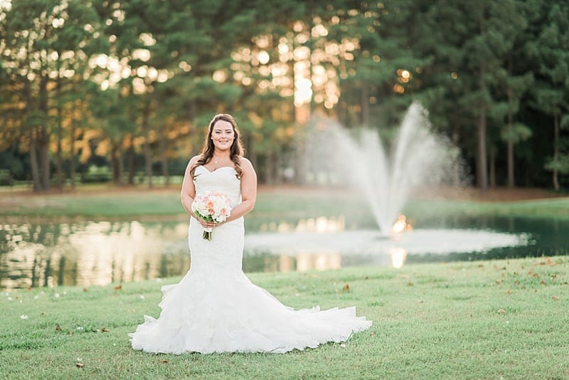 bridals in front of a fountain