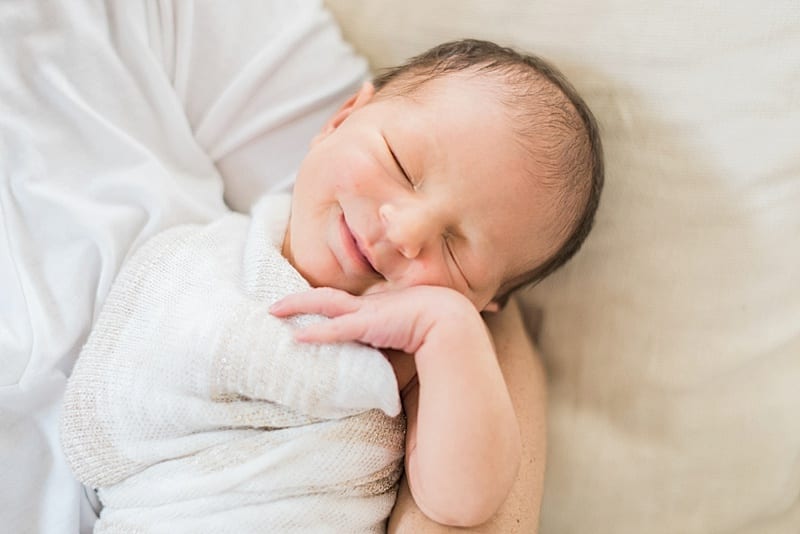 raleigh, nc newborn baby girl smiling photo