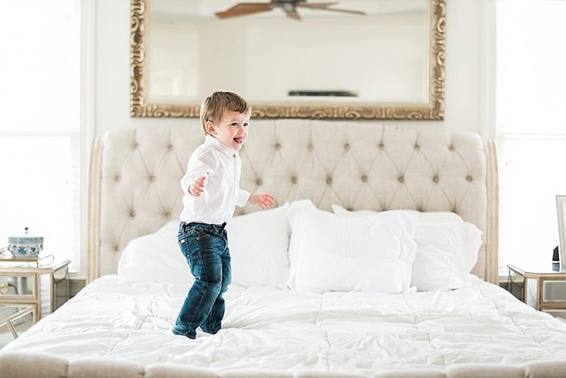 raleigh nc toddler lifestyle jumping on the bed photo
