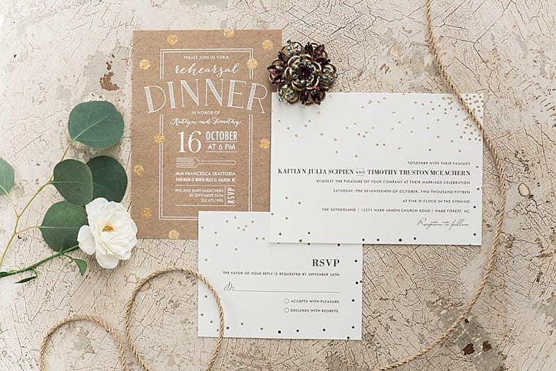 styled white and gold invitation suite photo