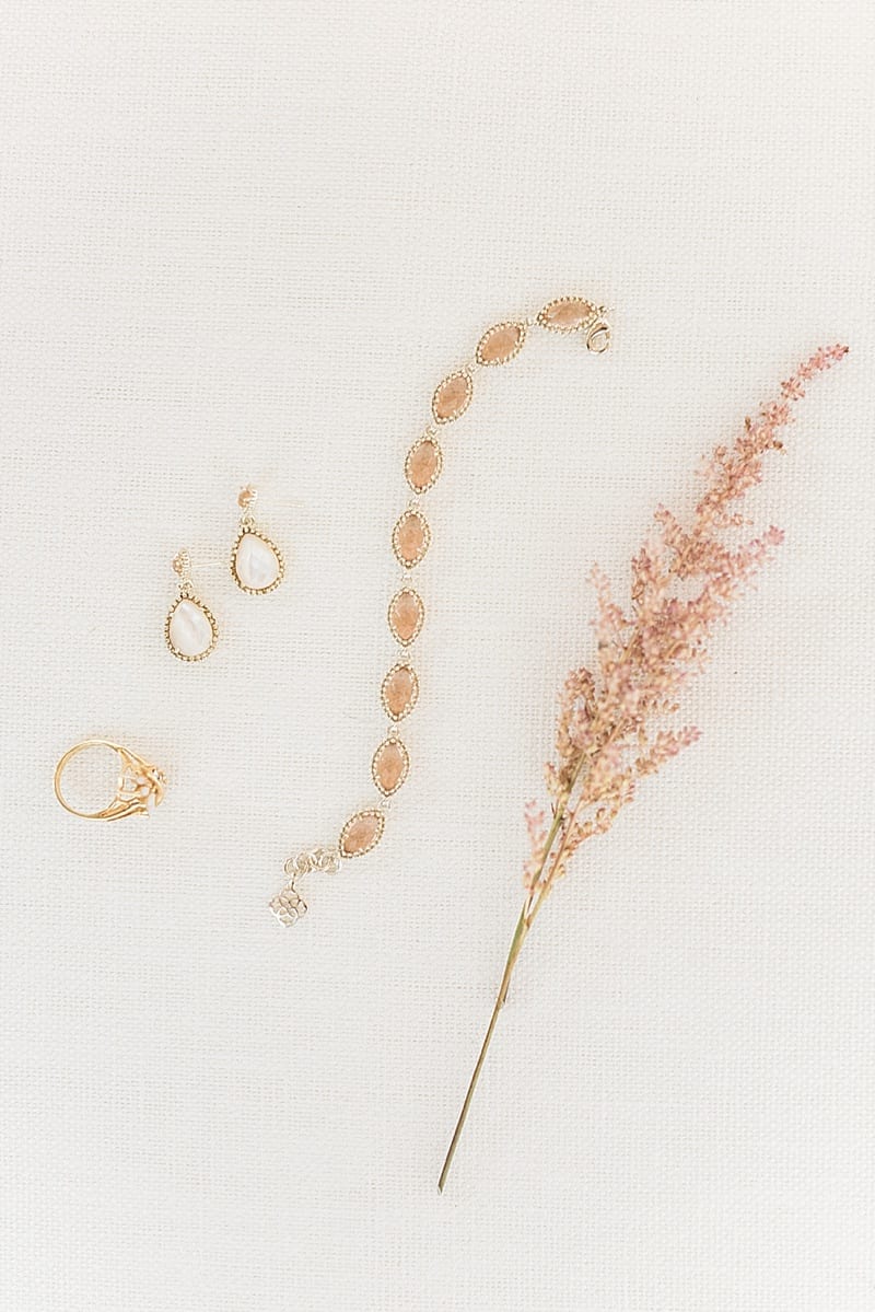 pink and rose gold bridal details photo