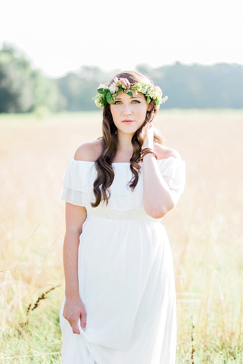 boho engagement attire with white flowing dress and flower crown photo