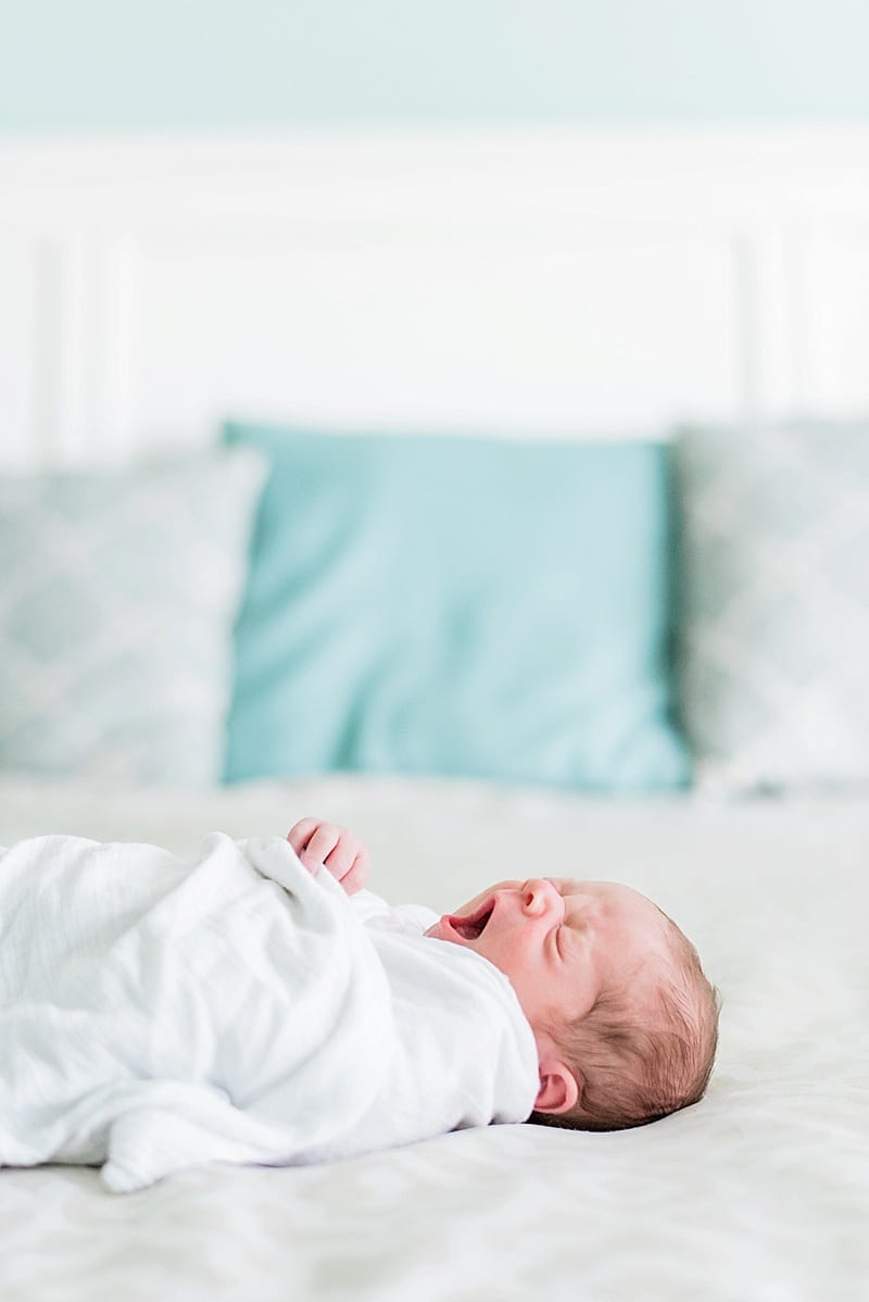 newborn baby boy yawning photo