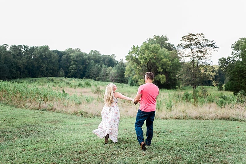 nc lively engagement photos with girl in a floral maxi dress photo