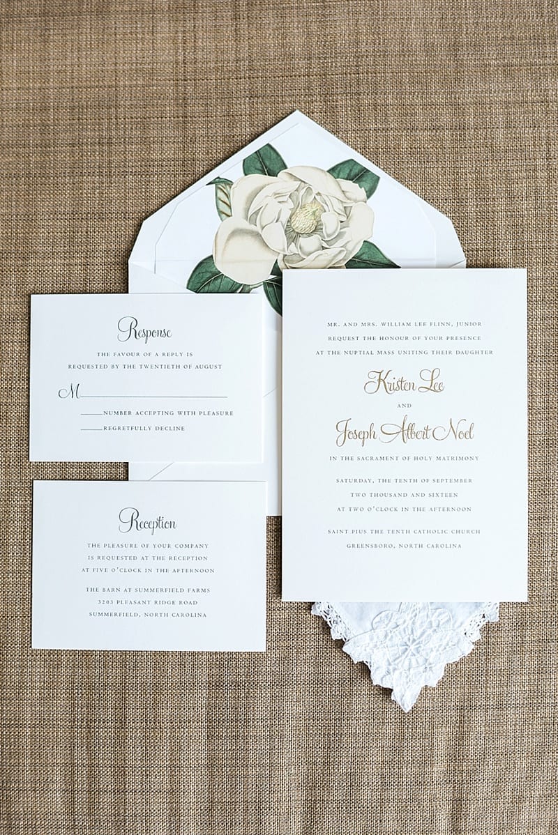 wedding invitation suite with magnolia envelope liner photo
