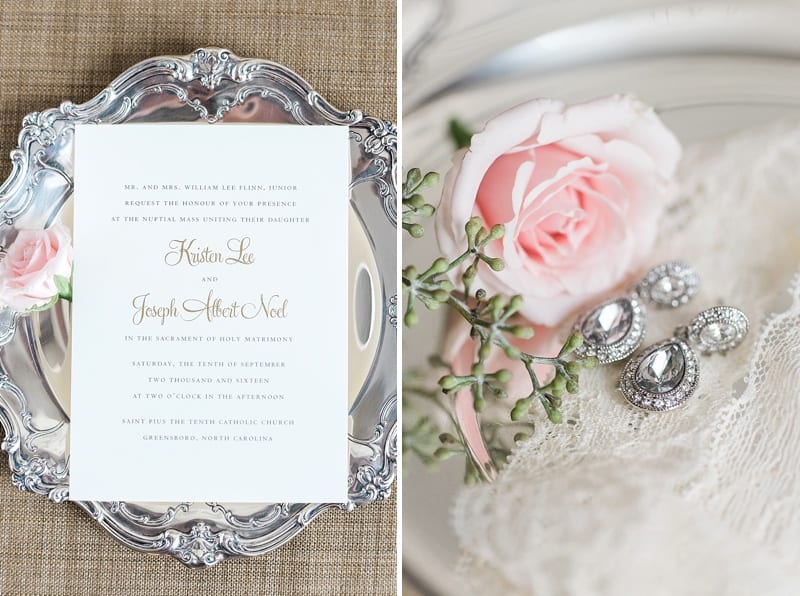 white and gold wedding invitation on a silver platter photo