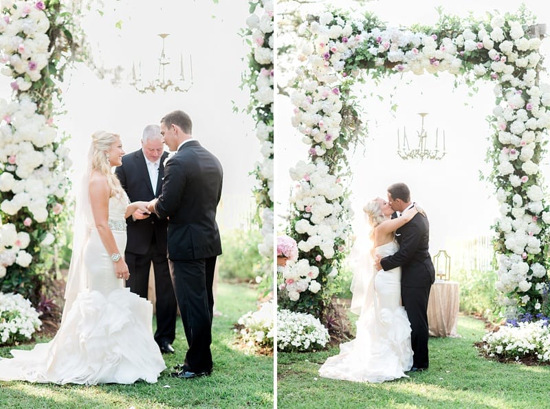 watson house and gardens emerald isle nc bride and groom kiss ceremony photo