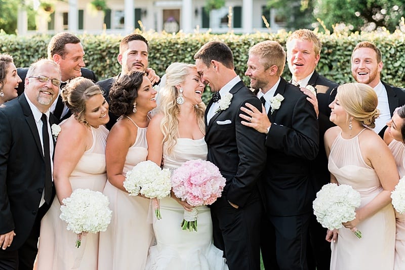 watson house and gardens emerald isle nc wedding party laughing photo