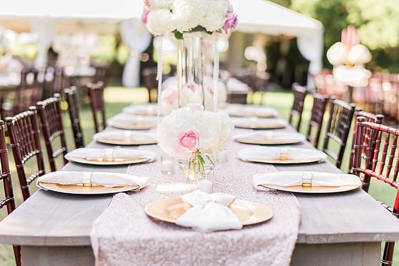 farm table with pink sequin runner wedding reception decor photo