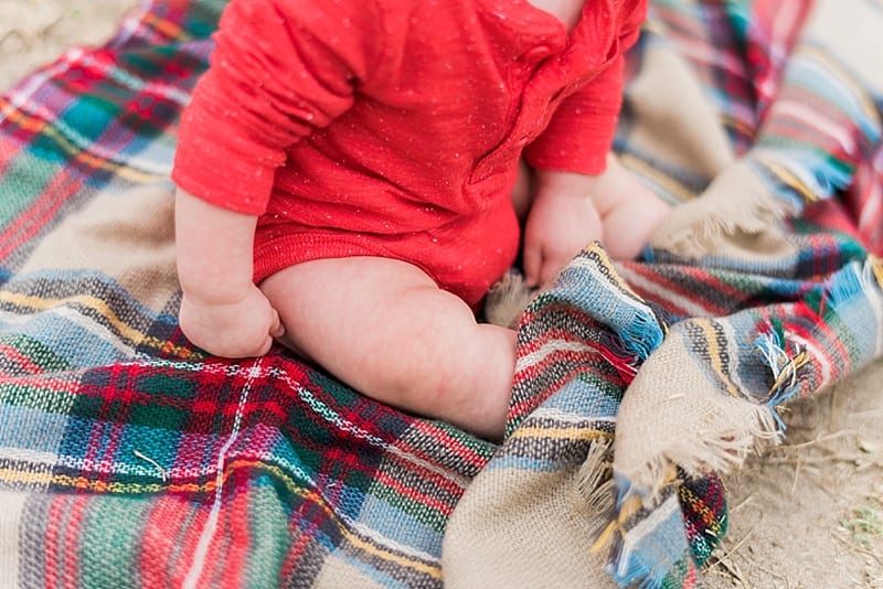 baby toes in a flannel blanket photo