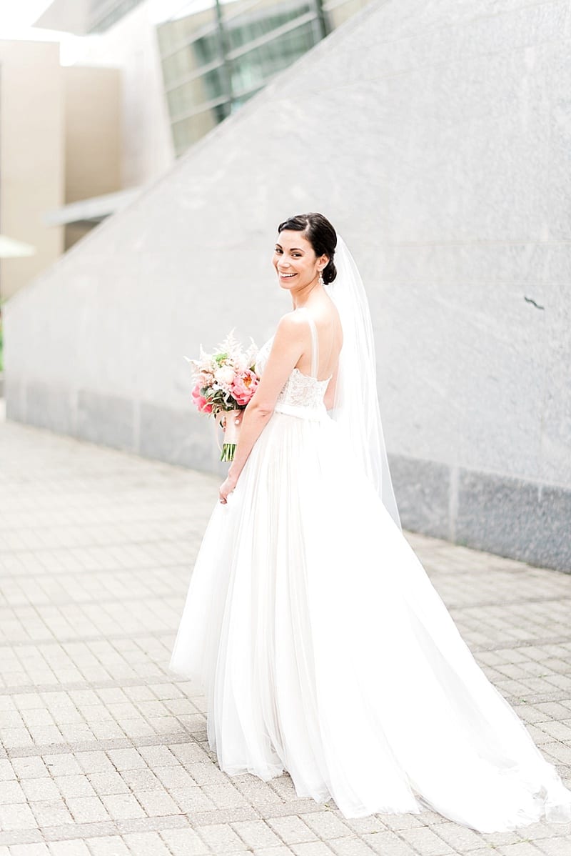 raleigh nc bride laughing in bhldn gown photo