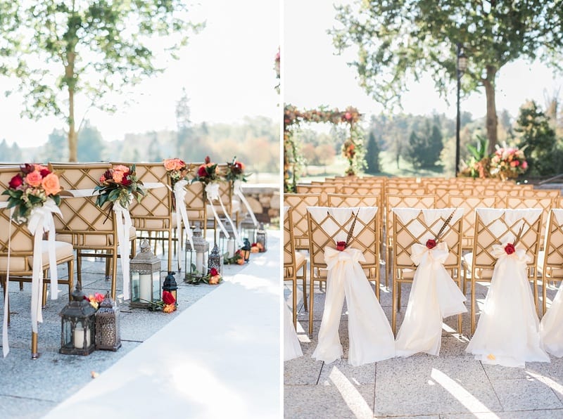 wedding ceremony chairs tied with roses and ribbon photo