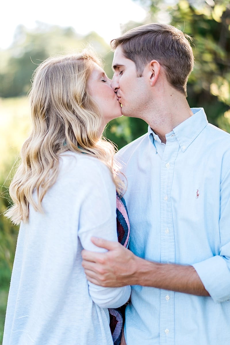 raleigh kissing engagement photo