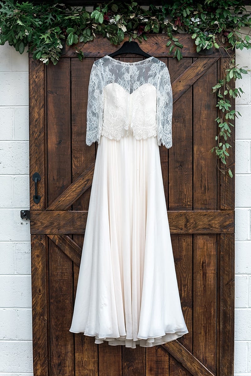 truvelle bridal lace sleeve gown photo