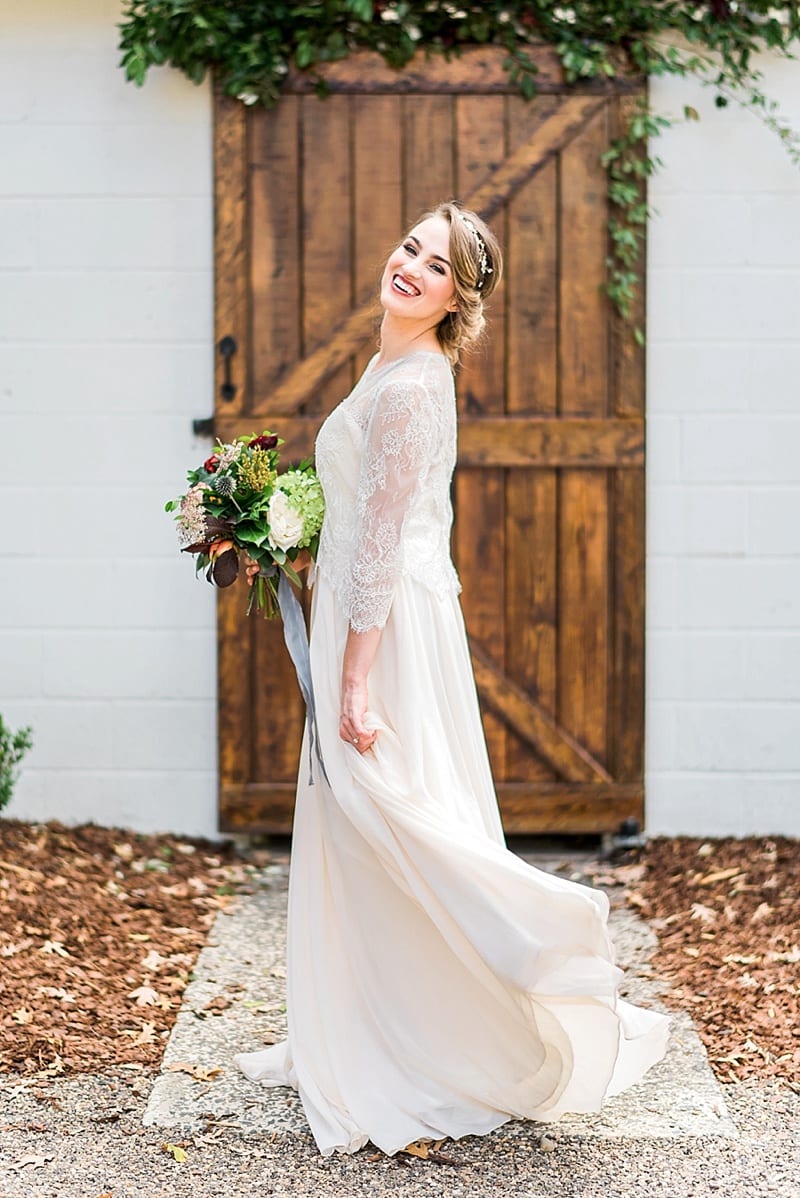 truvelle bridal gown with lace sleeves photo