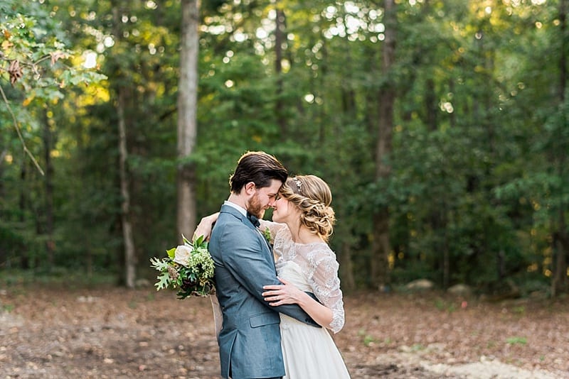 raleigh nc bride and groom portraits in the woods photo