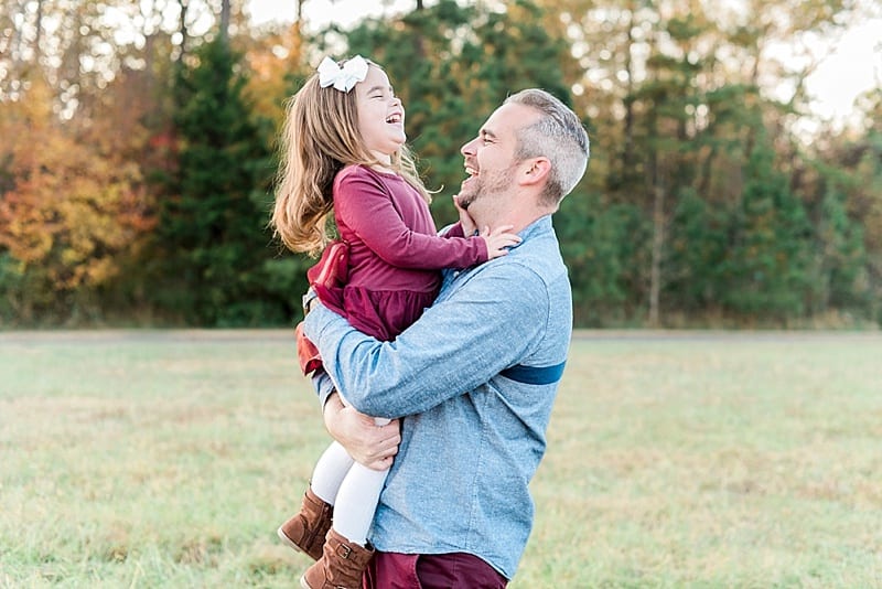 wake forest father laughing with daughter photo