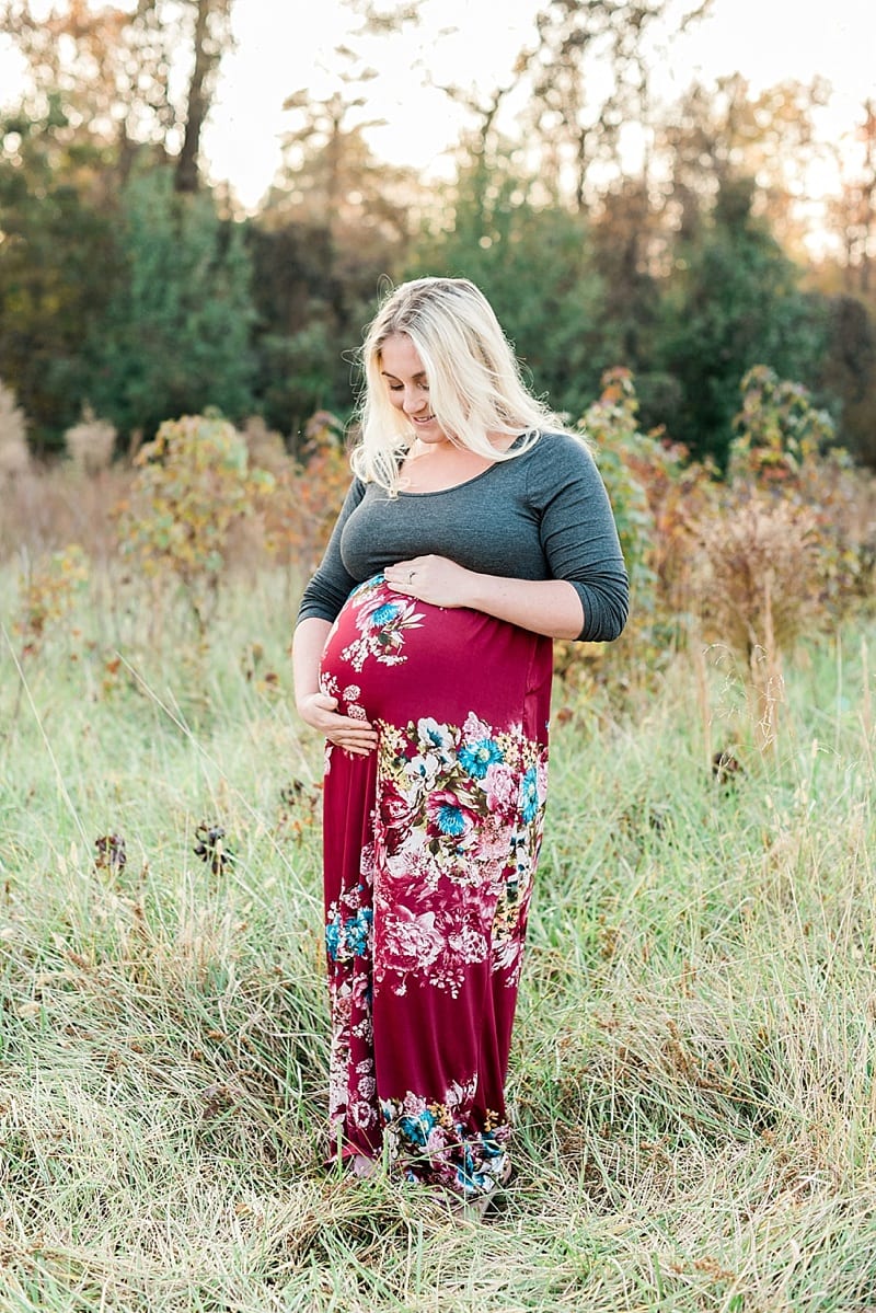 wake forest maternity in a field photo