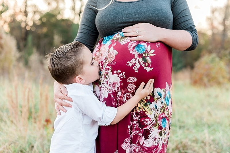 wake forest son kissing baby brother in belly photo