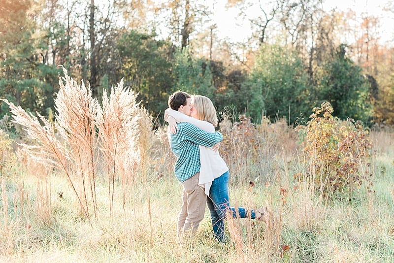 raleigh couple hugging foot up photo