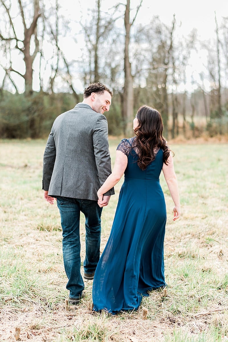 raleigh engaged couple walking from behind photo