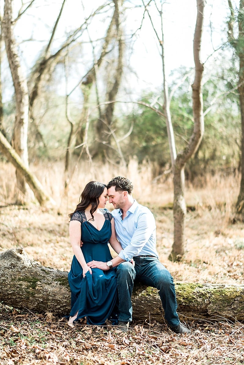 raleigh fine art sitting on a tree engagement photo