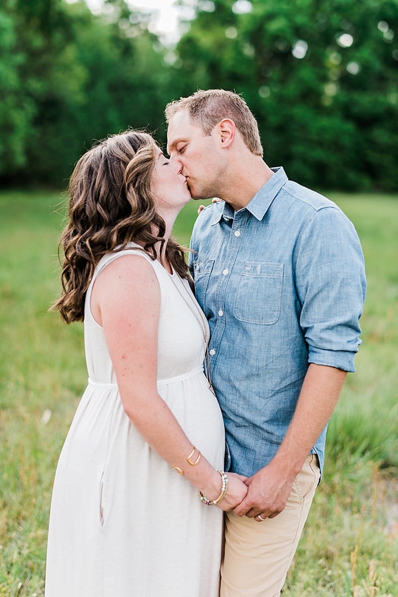 raleigh kissing maternity photo