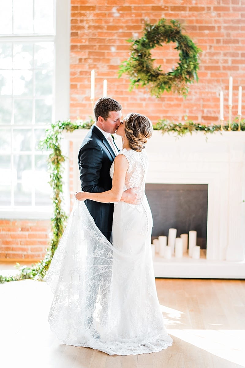 cotton room wedding bride and groom kissing photo