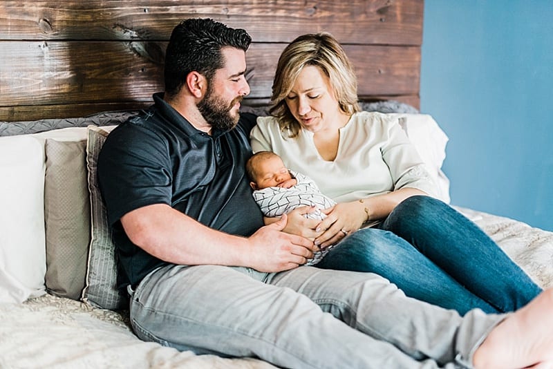 raleigh, nc family snuggling with newborn photo