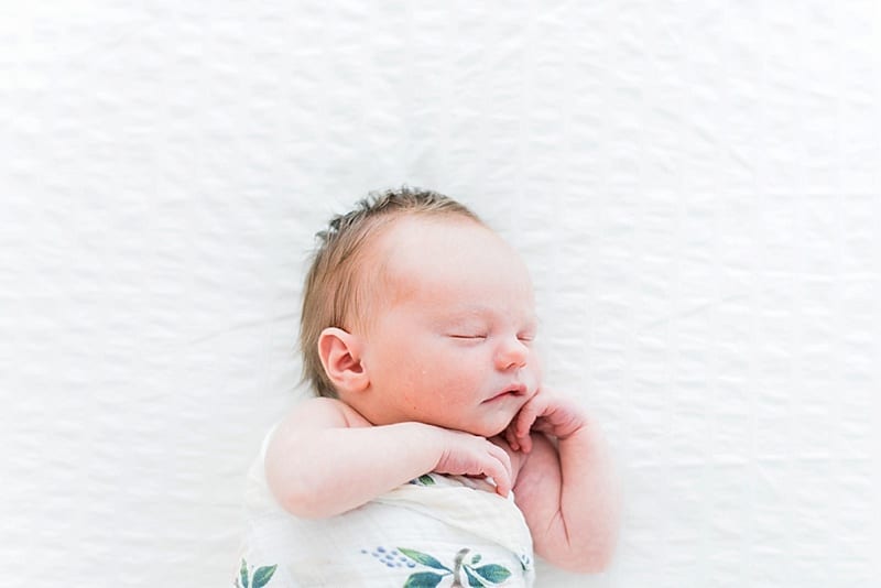newborn on white ikea quilt photo