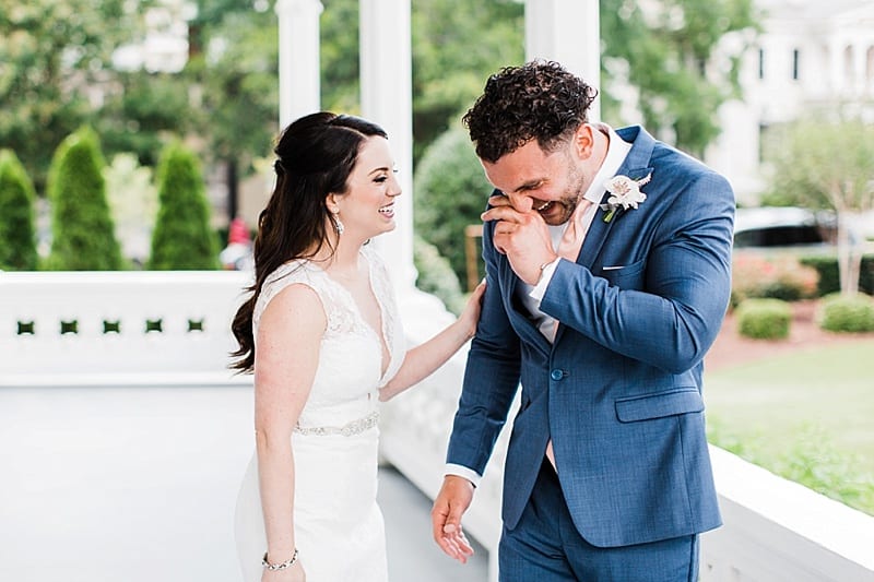 bride and groom emotional during first look photo