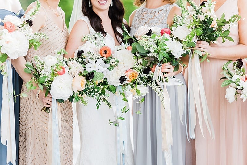cascading bridal party bouquets photo
