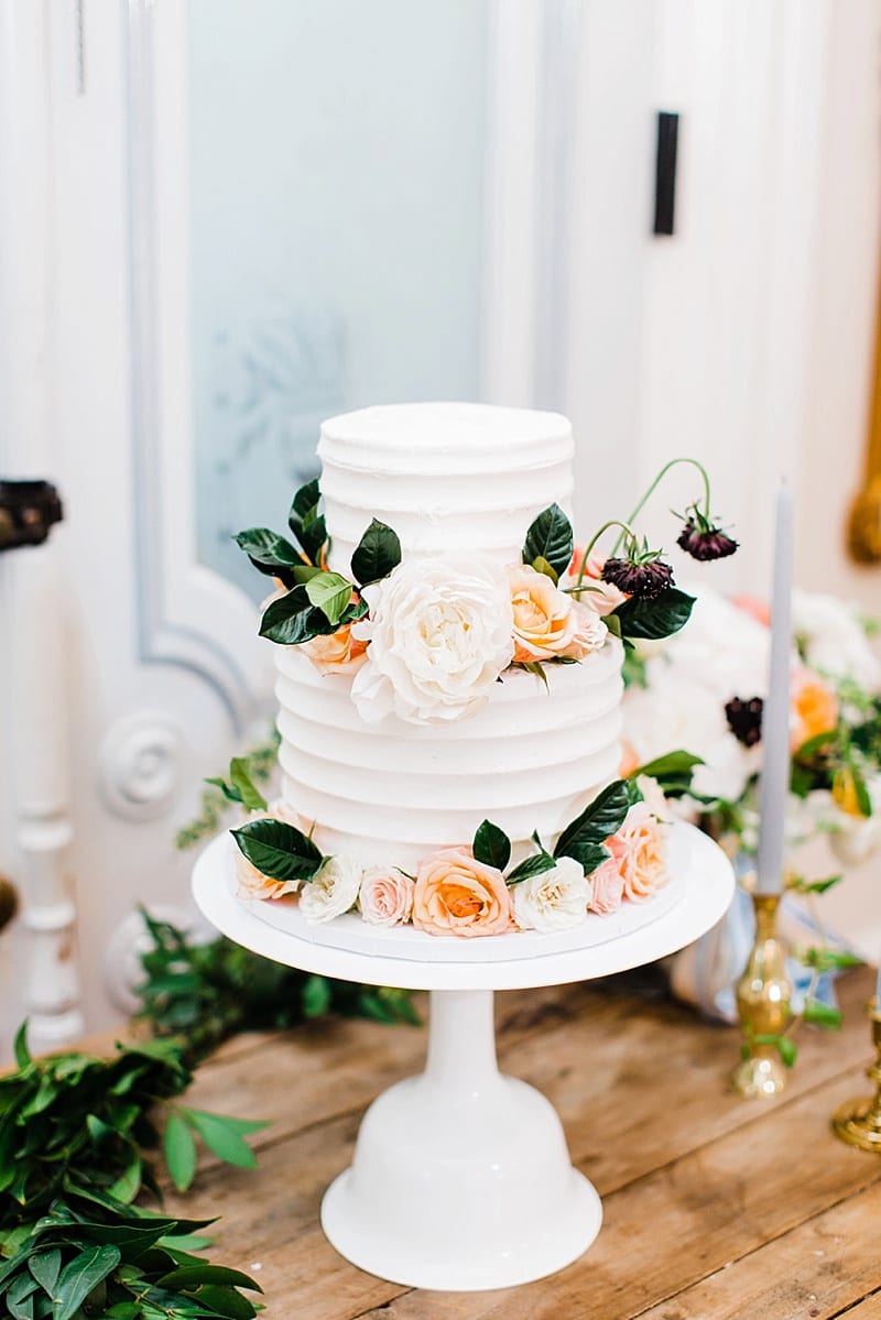 sugar euphoria wedding cake with florals photo