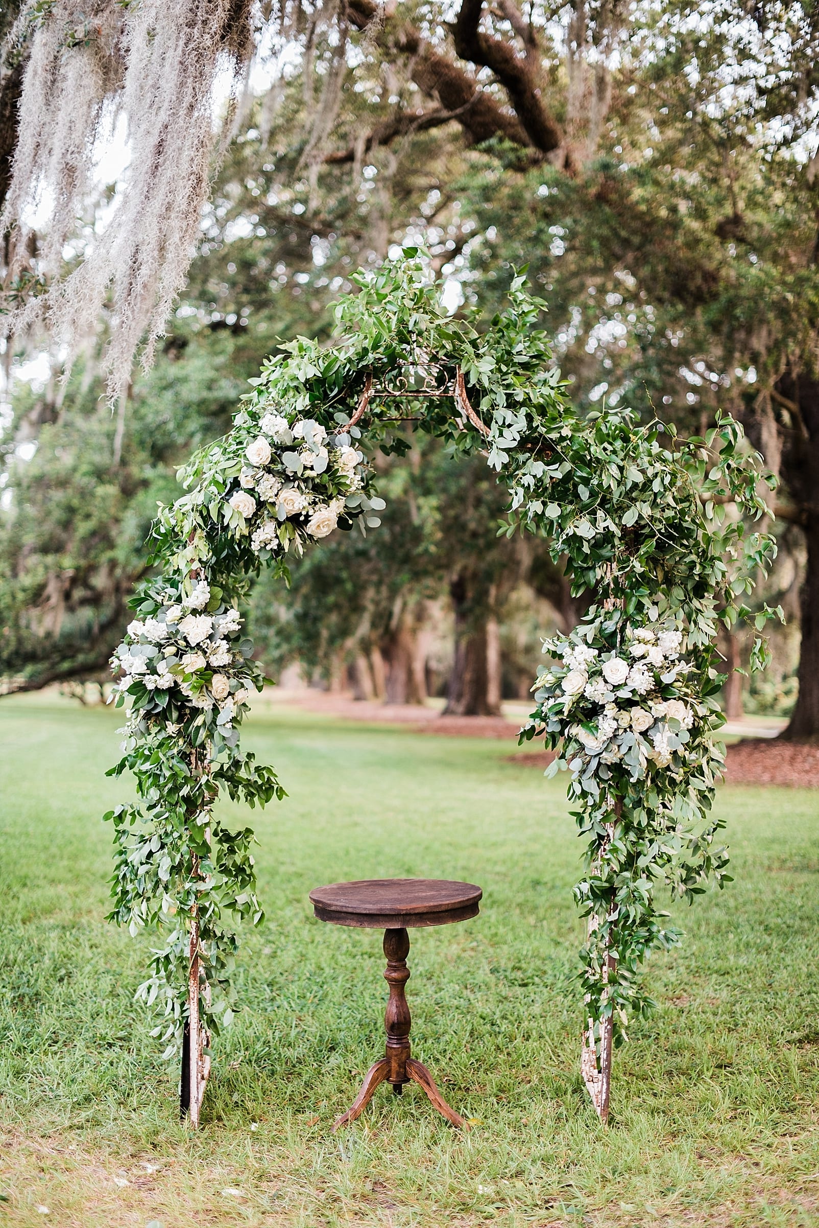 boone hall plantation wedding ceremony wooden sign wood chairs ooh events 