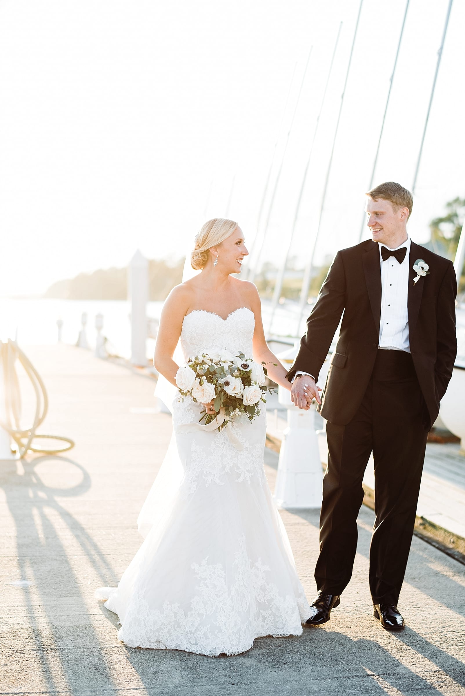 kingsmill resort wedding photography bride and groom at james river boats sunset photo