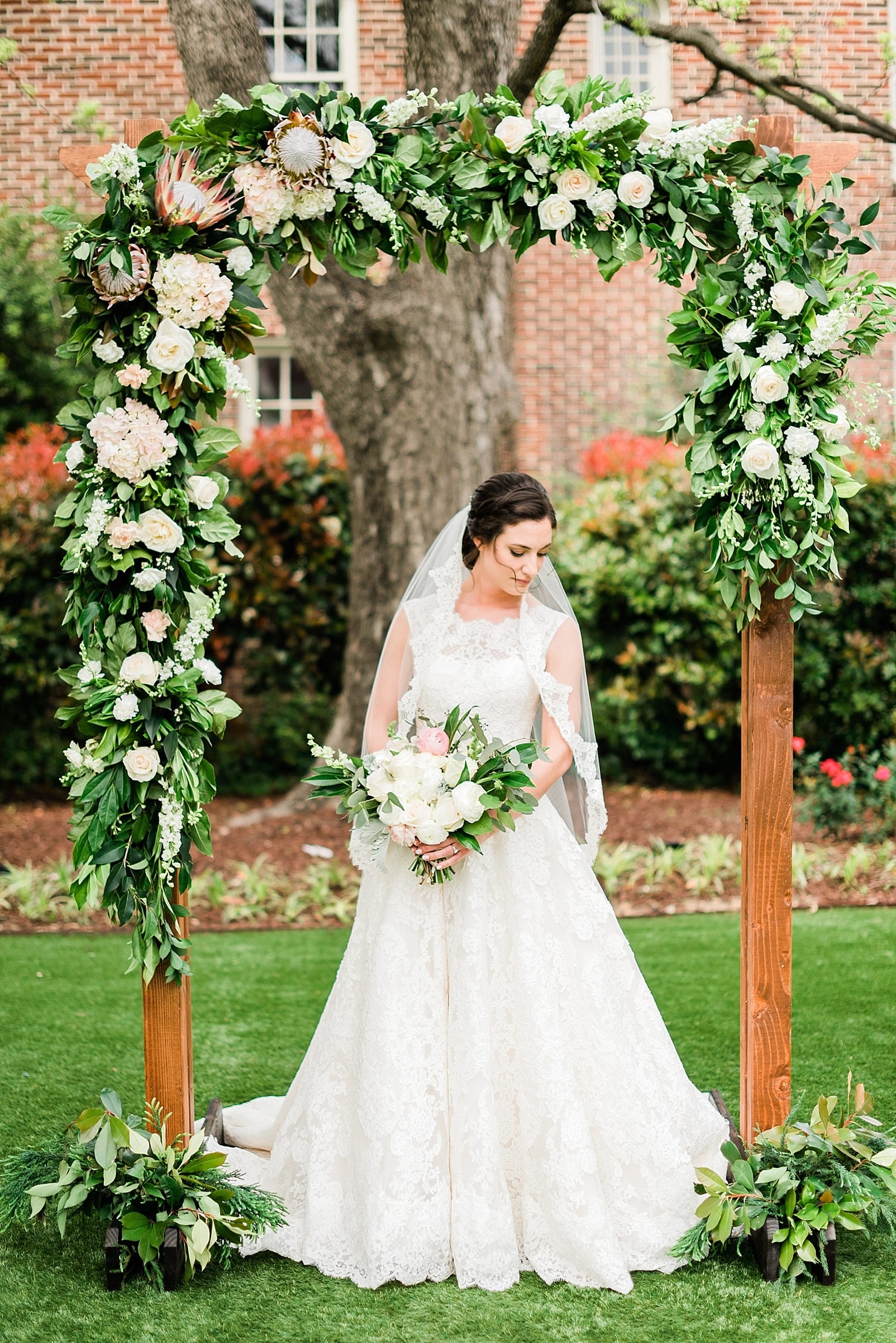 raleigh wedding venue merrimon wynne wedding photographer bridal portrait inspiration floral arch photo