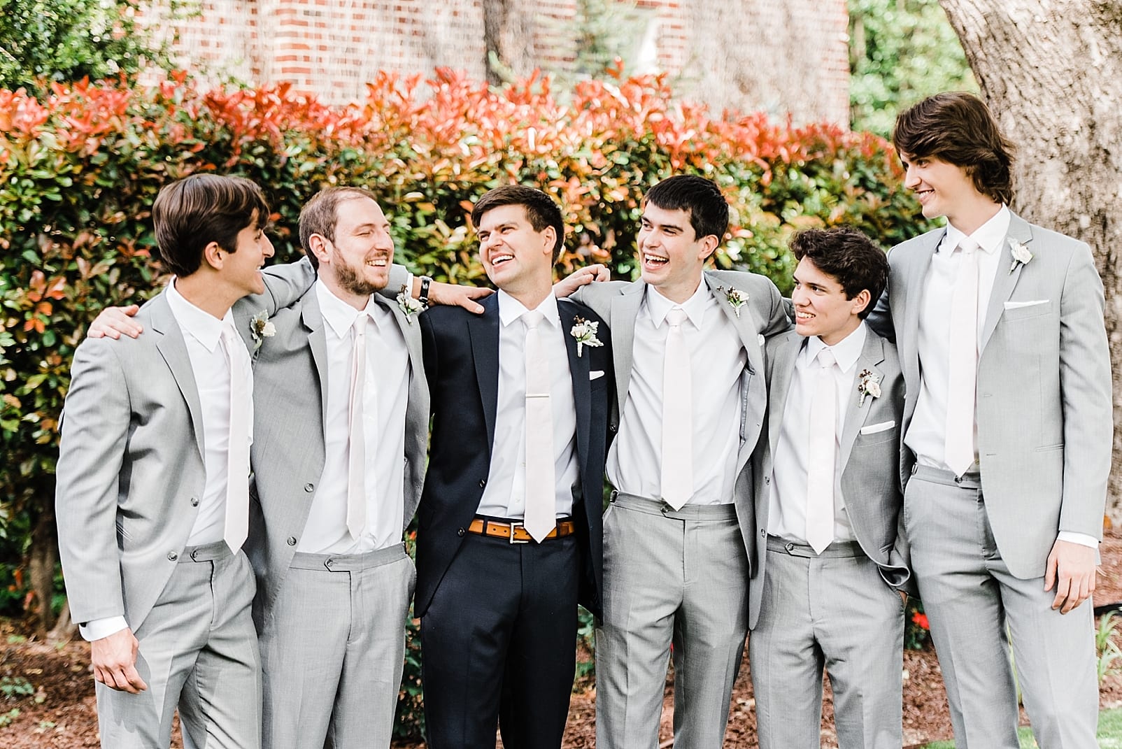 raleigh wedding photographer groomsmen in grey suits blush wedding inspiration photo