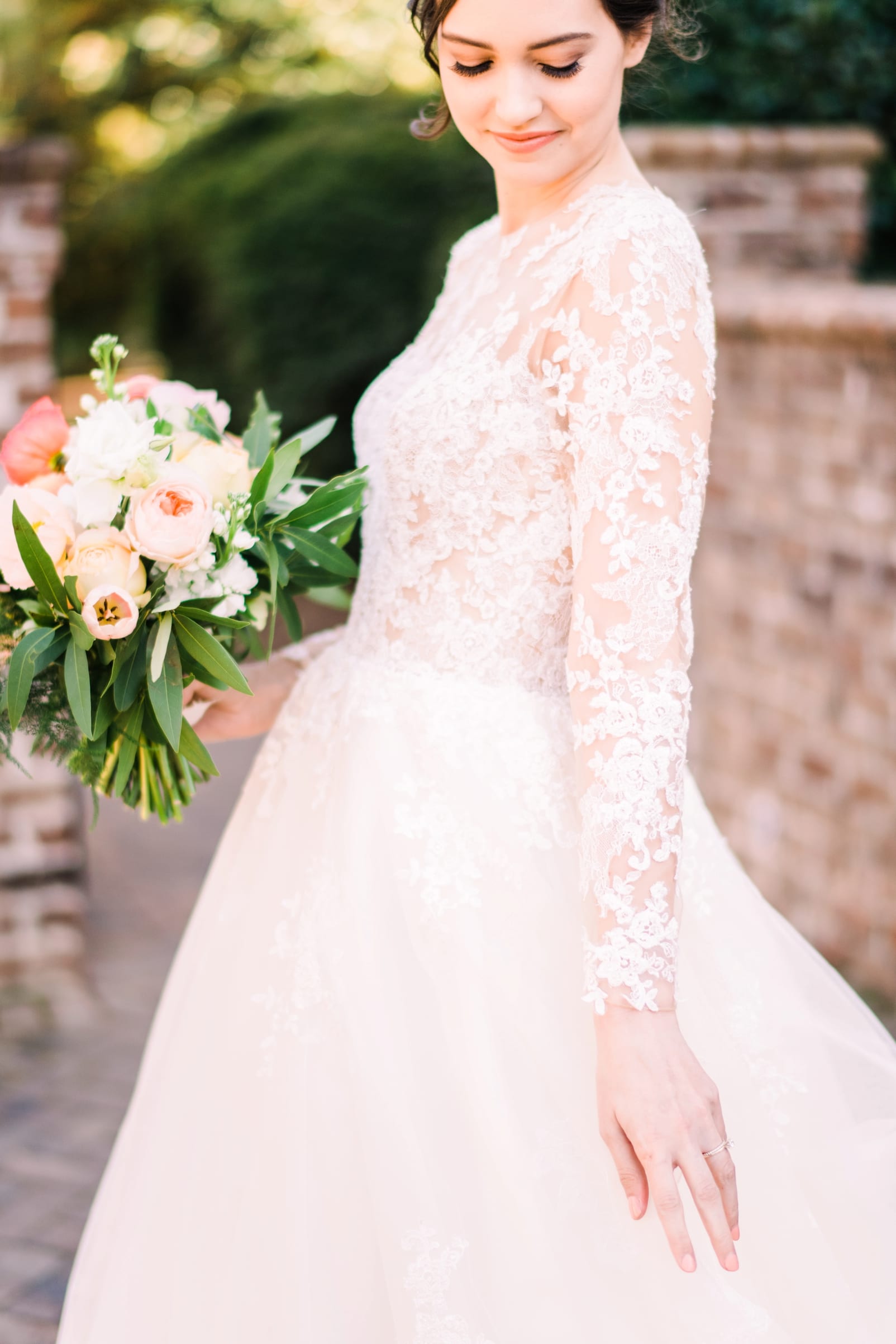 tre bella long sleeved lace wedding dress photo