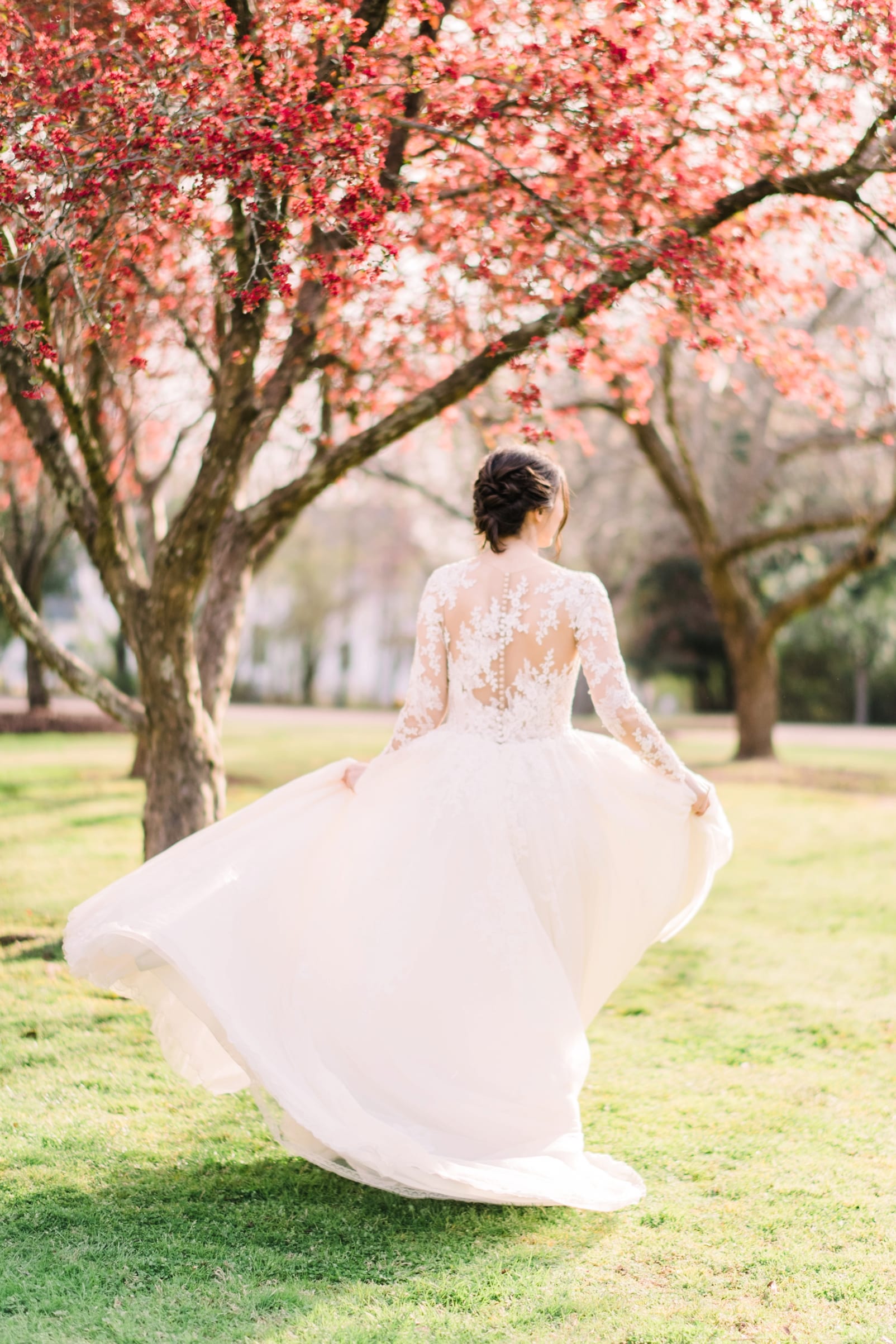 the sutherland bride twirling under a tree photo