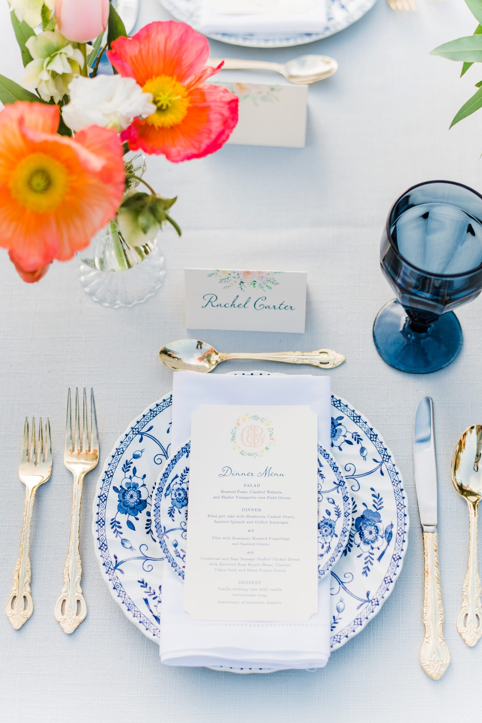 greenhouse picker sisters reception place setting with blue and white china photo