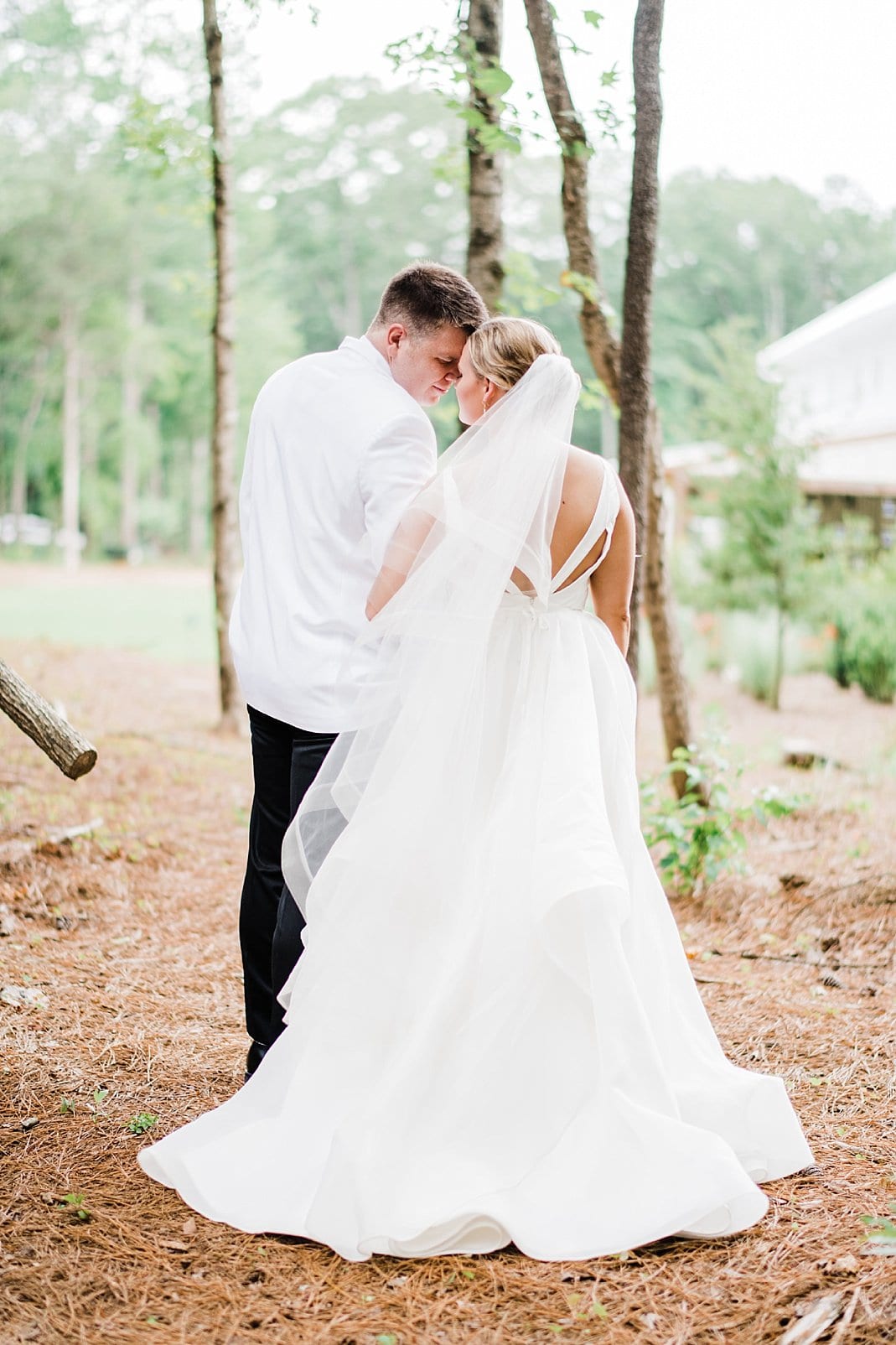 chapel hill, nc bride with veil and sleeveless wedding gown photo