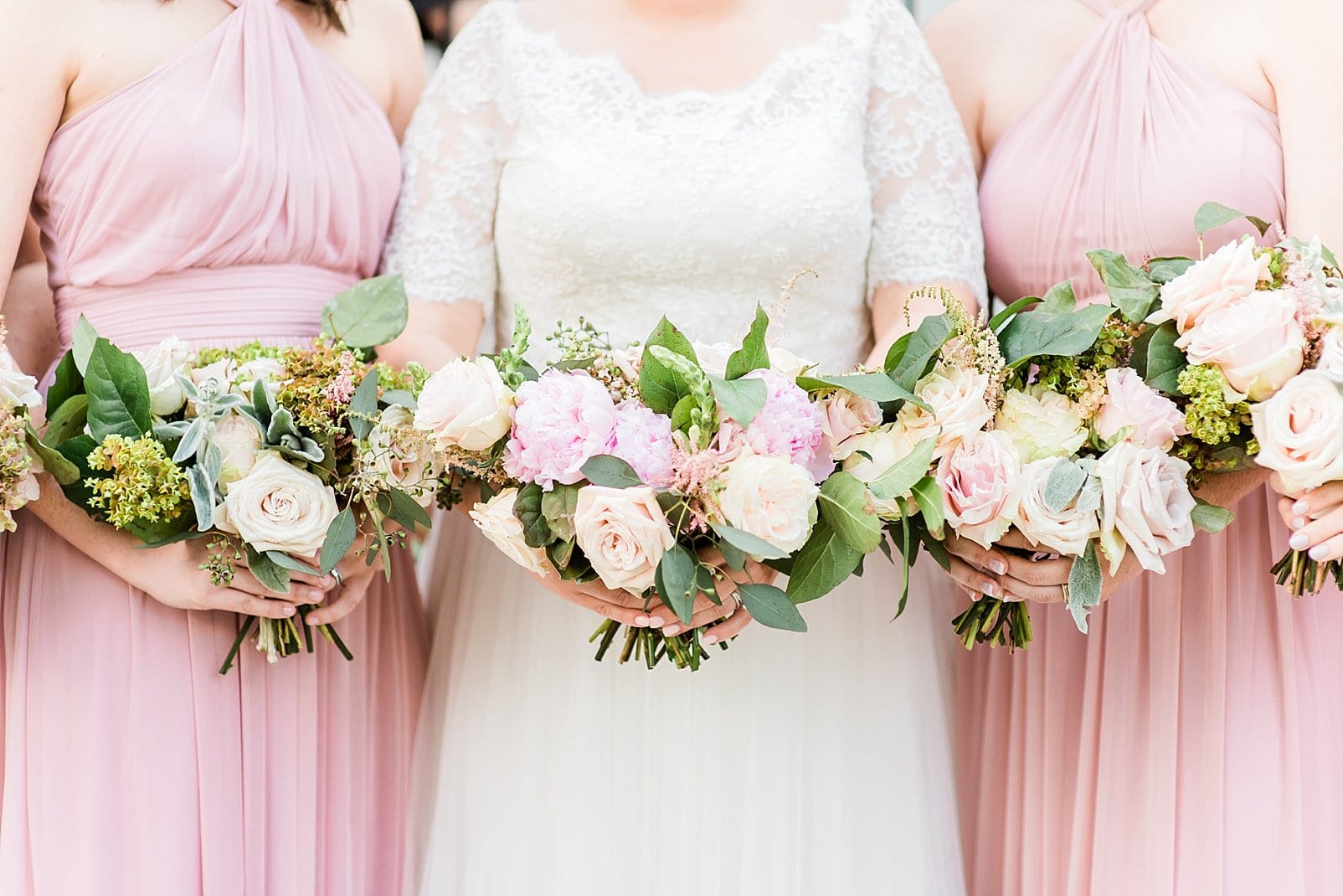 bushel and peck designs bridal bouquet with white and light pink flowers photo