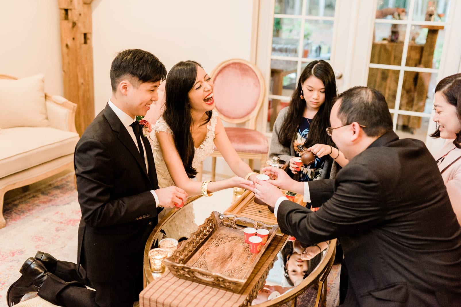 Chapel Hill, NC bride and groom during traditional Chinese tea ceremony photo
