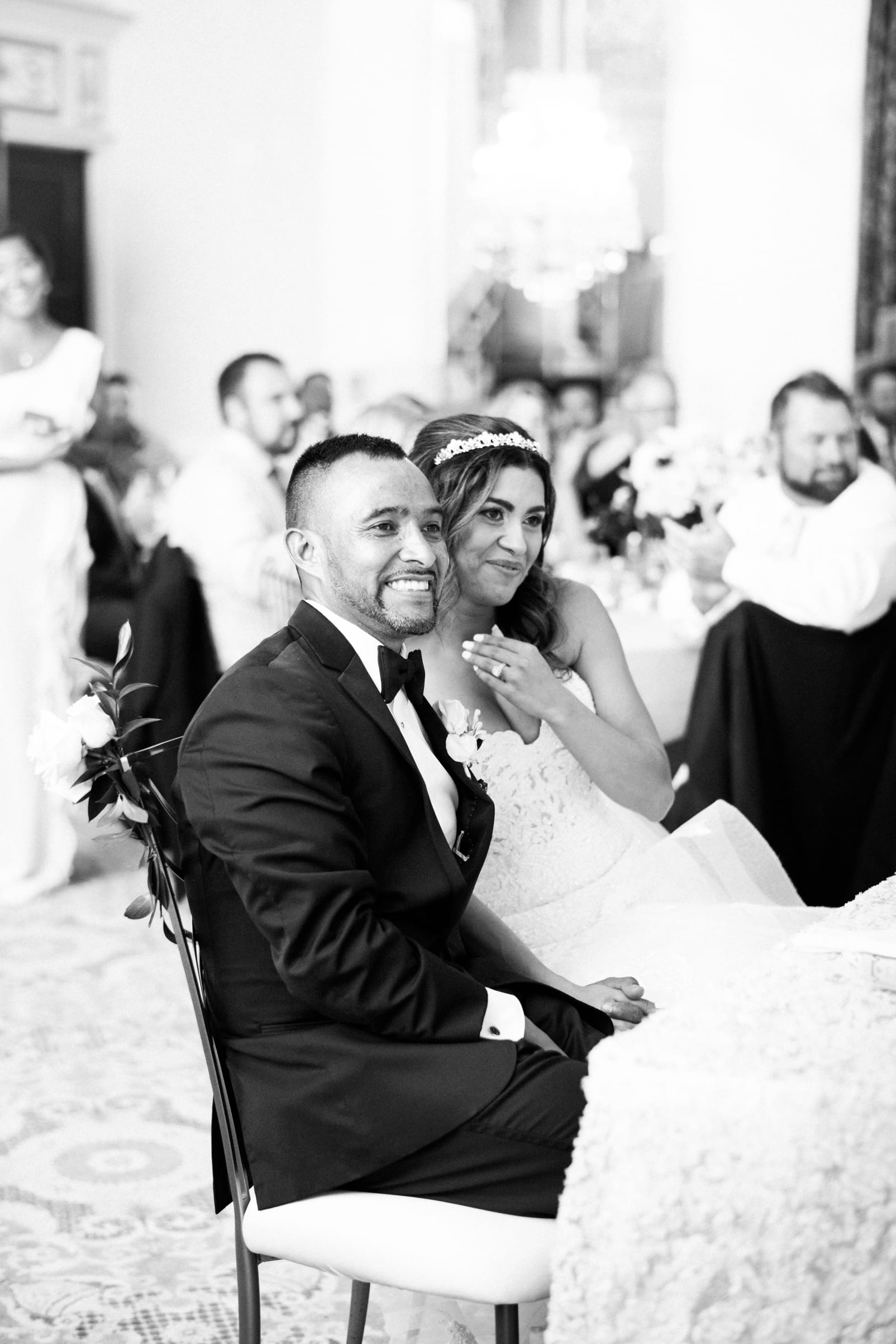 Grand Marquise ballroom bride and groom laughing during toasts photo