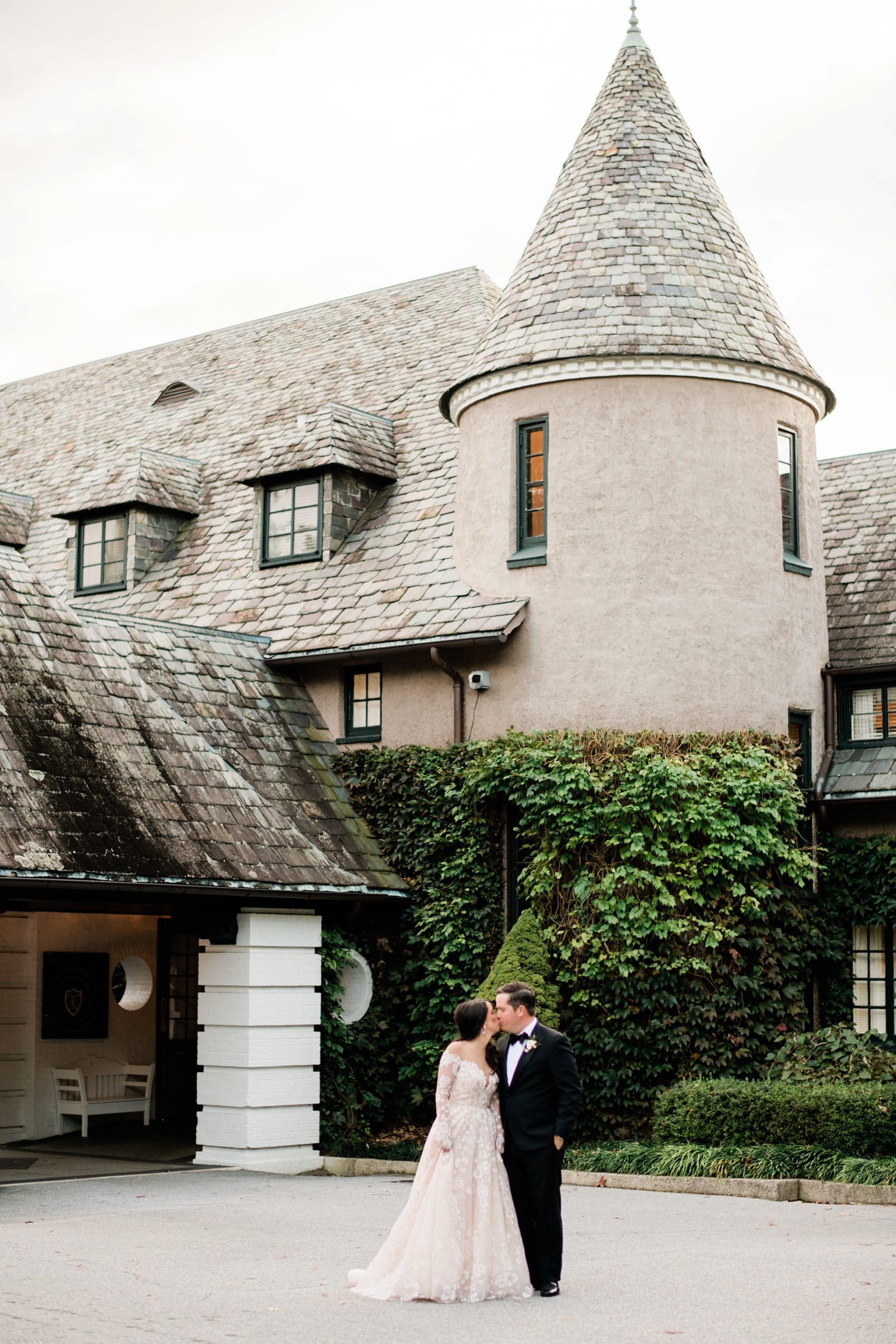 Biltmore Forest Country Club bride and groom standing in front of the main building photo