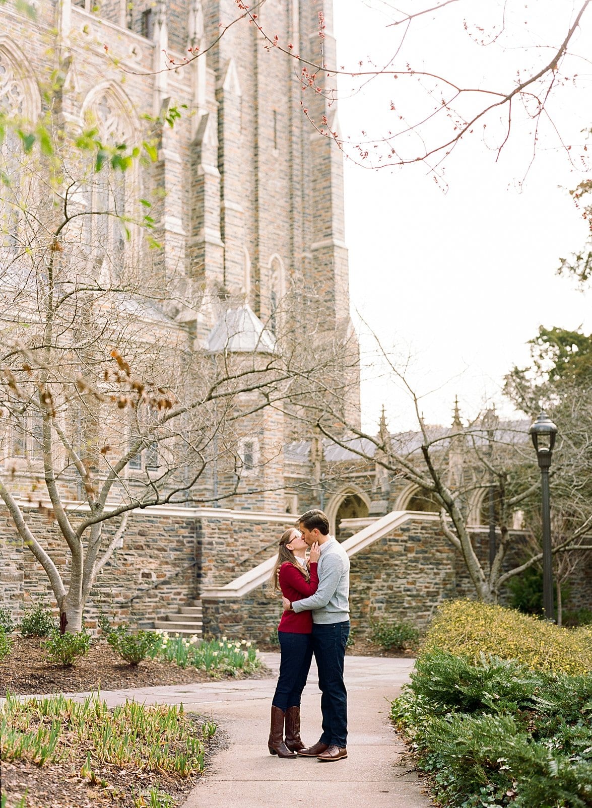 Duke University couple kissing on Duke campus photo