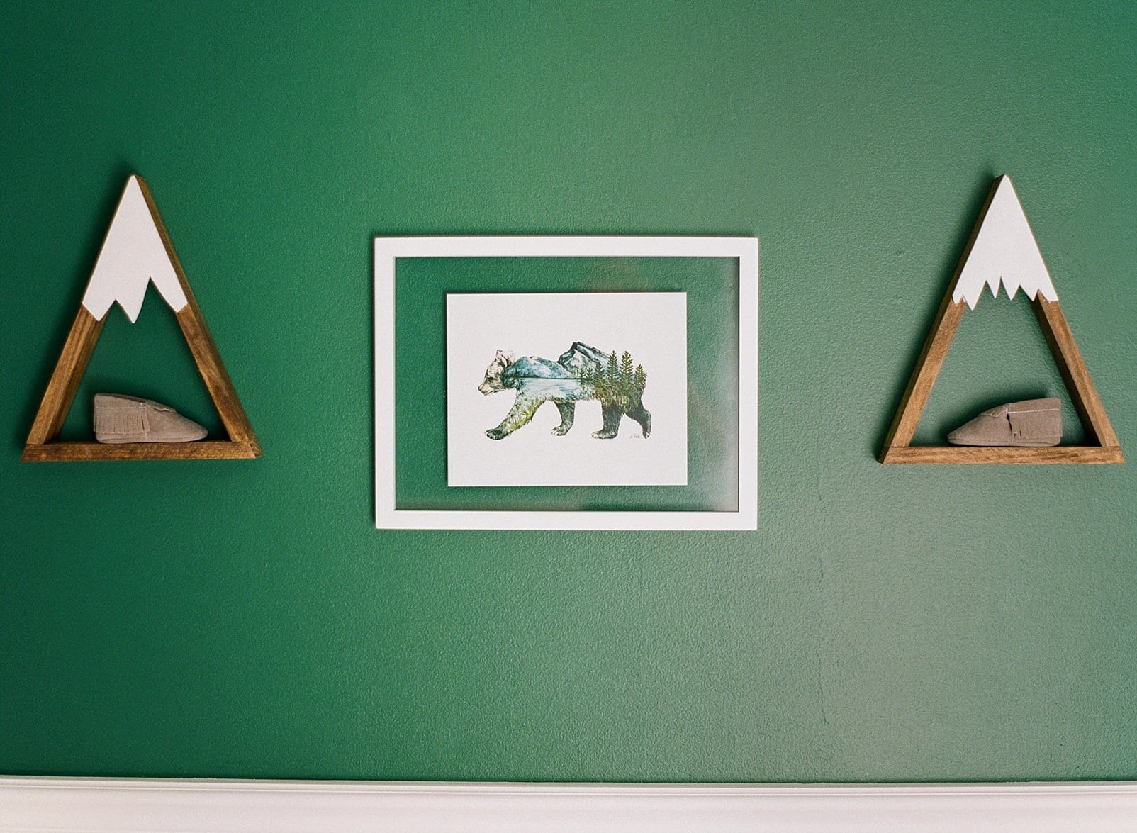Raleigh nursery with framed print of a bear hung on the wall photo