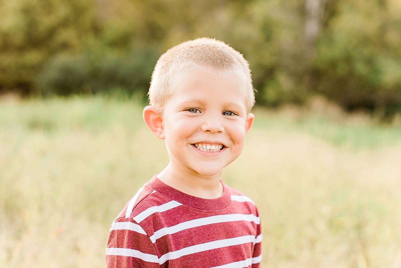 Wake Forest 5 year old boy in a red and white striped shirt photo