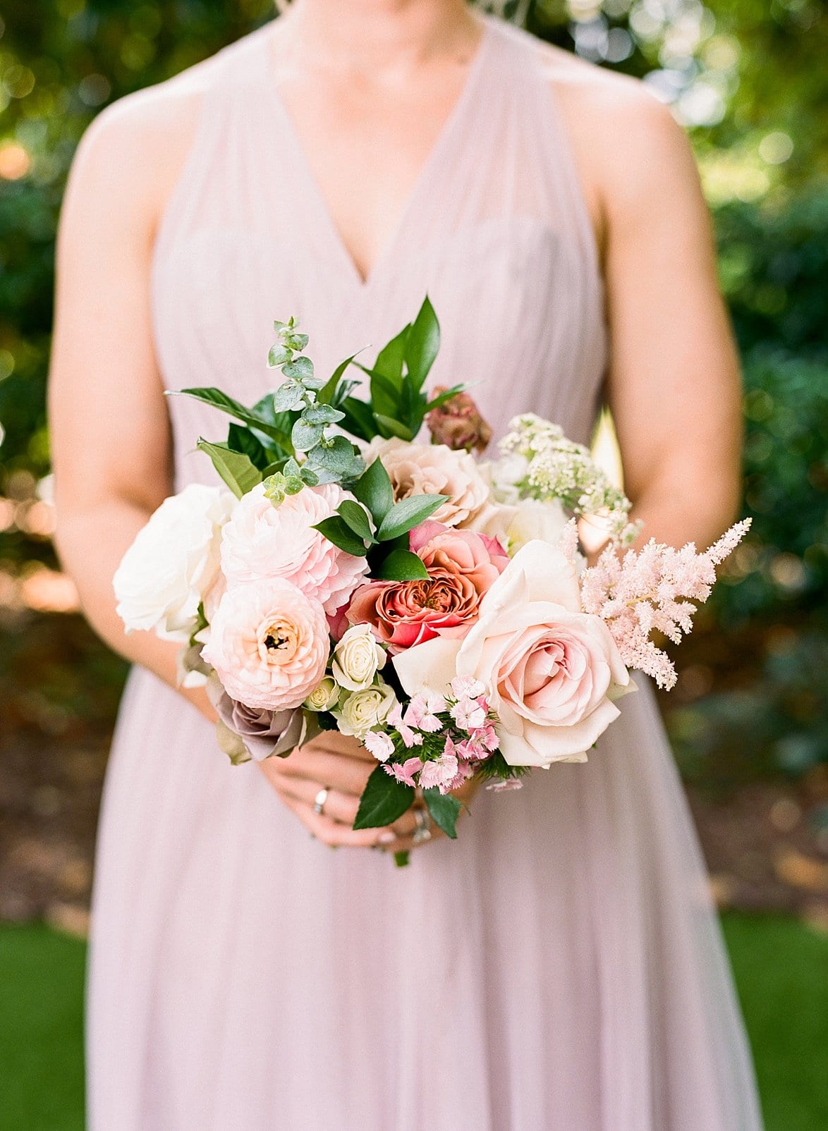 Specialties Events bridesmaids bouquet with light pink flowers and a little greenery photo